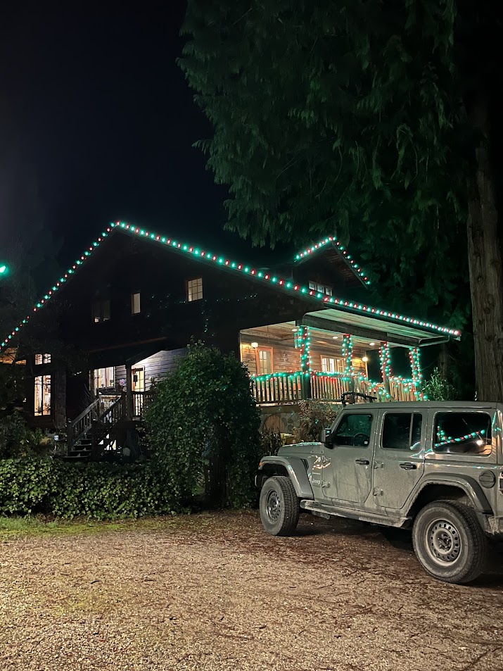 Green and red Christmas light installation Roberts Creek BC